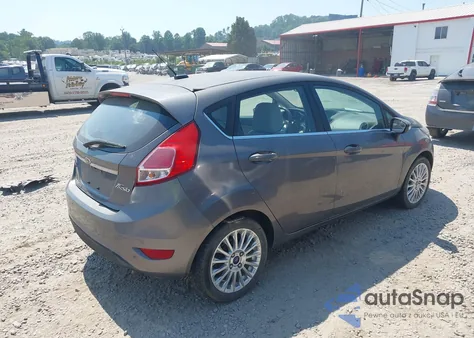 2014 Ford Fiesta Titanium из США, поврежденный, VIN 3FADP4FJ7EM106069